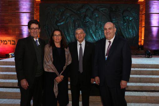 Yad Vashem Benefactors Jan and Rick Cohen (left) and Yad Vashem Supporter, Second Generation Benjamin Warren (right) with Chairman of the Directorate of Yad Vashem Avner Shalev (second from right) at the Yom Hashoah 2014 State opening ceremony.